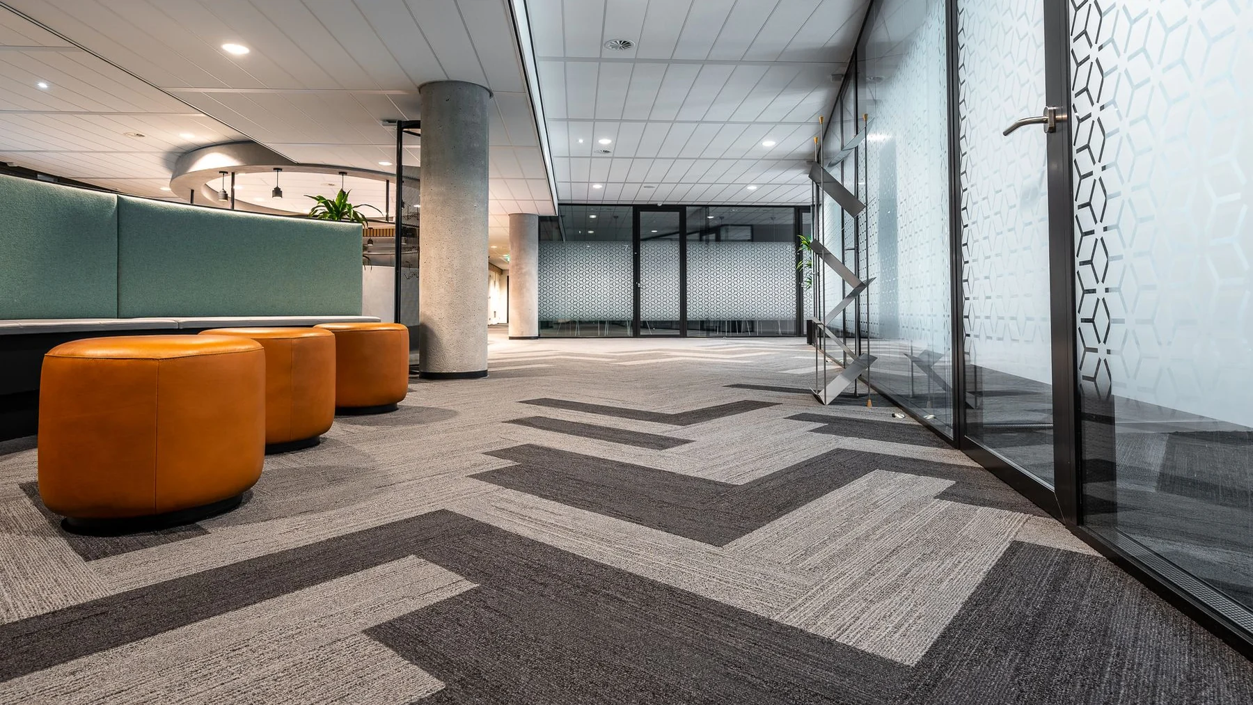 Spotless modern commercial interior with polished floors and glass partitions